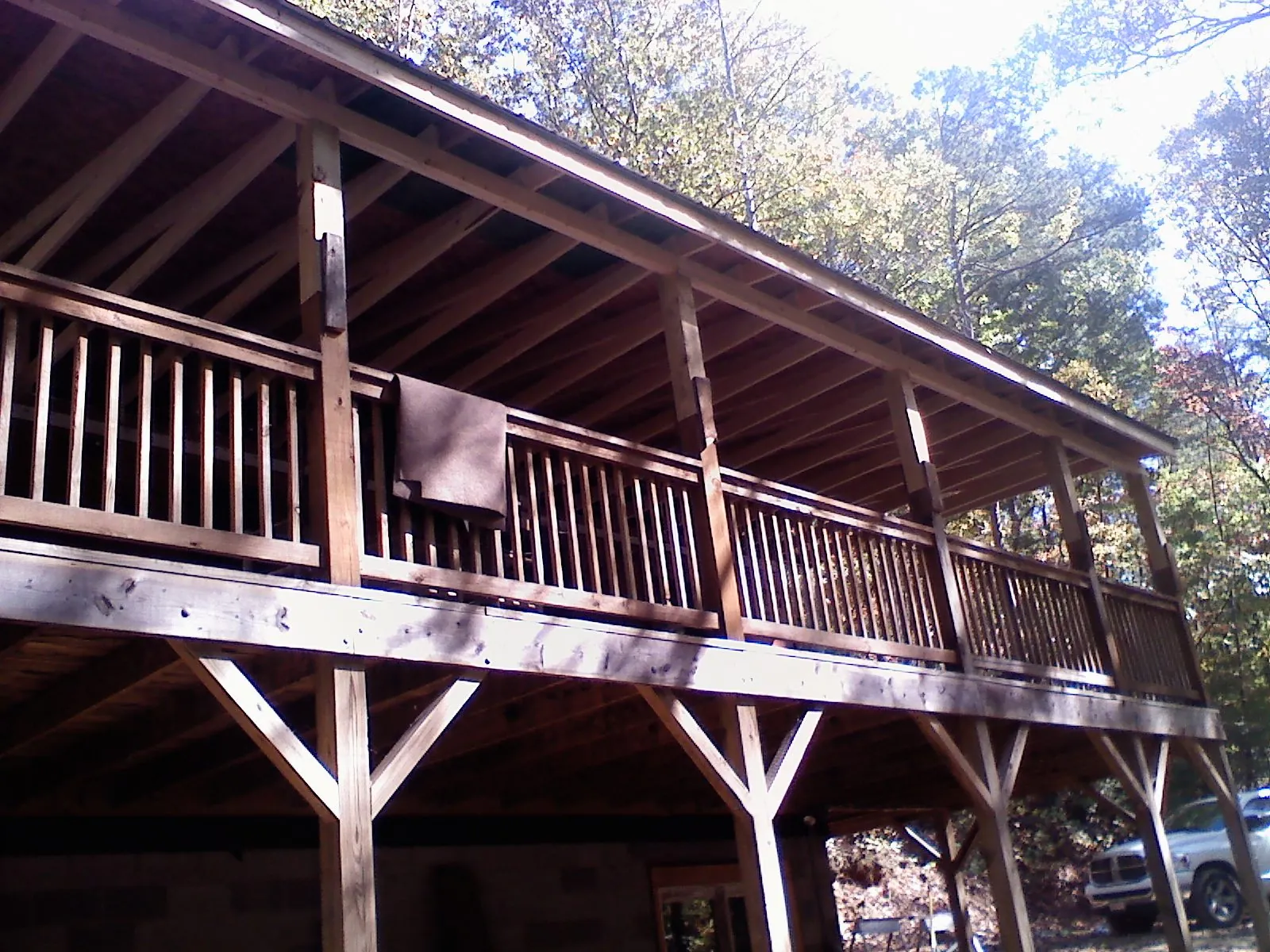 Timber framing under a new elevated porch and deck — Roof Leak Repair in Basalt by Roofing Brothers